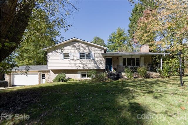 Welcome home.  Great front yard and covered front porch just waiting for you.