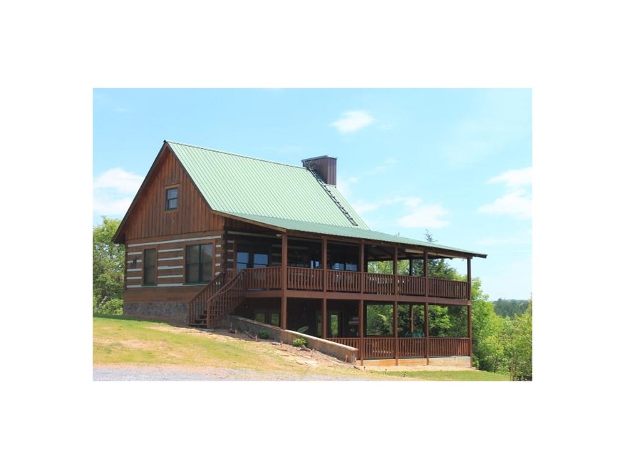 Spectacular Log Cabin on approximately 3 acres wit