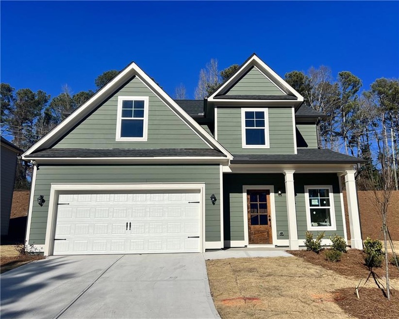 Craftsman-style home with a garage