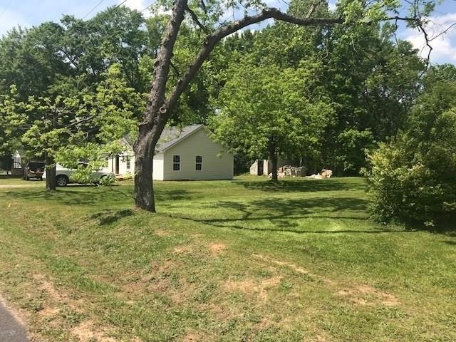 Huge lot on a corner. The home faces the Rail Road