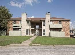 View of property featuring fence