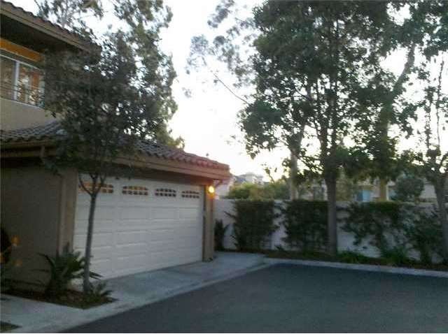 End unit with open area views situated on elevated