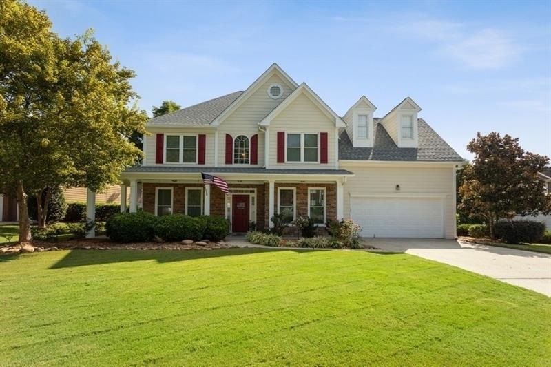 Beautifully landscaped yard with excellent curb ap