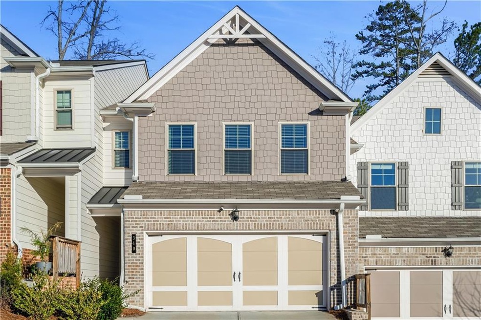 View of front of home featuring a garage