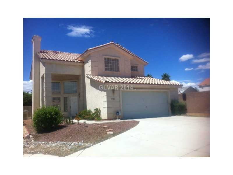 Facade/Exterior Front. Long driveway