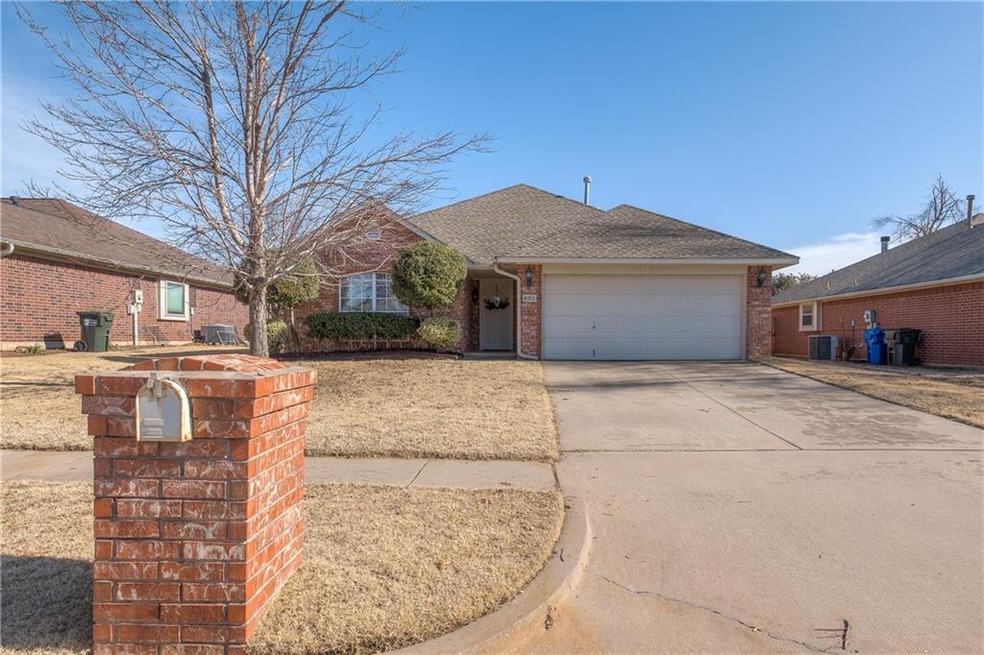 4105 Gyrfalcon Dr, Norman, OK 73072 - photo 1