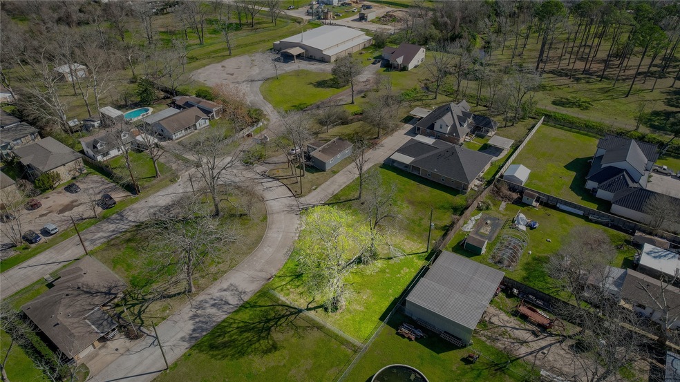 Expansive, cleared lot spanning approximately 0.21