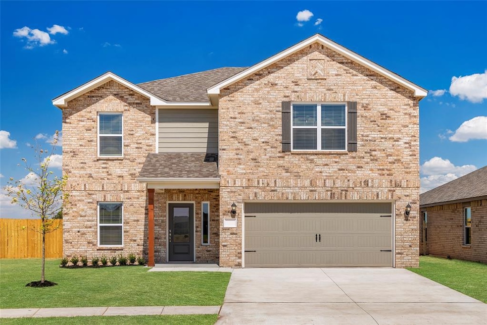 Welcome home to this beautiful two-story brick res