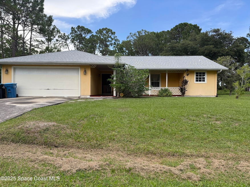 831 Fletcher Rd SE, Palm Bay, FL 32909 - photo 1