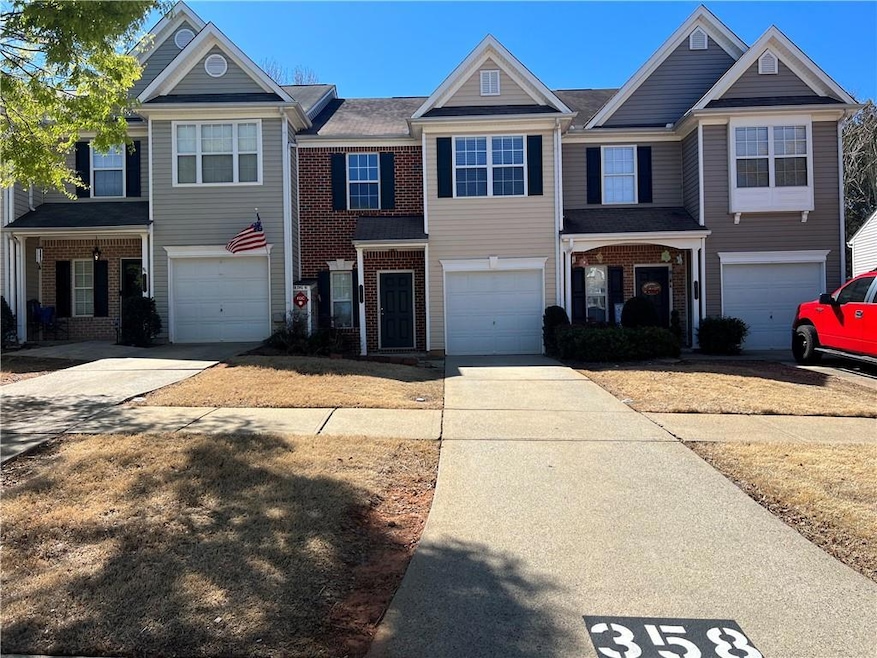 Townhome / multi-family property with an attached 