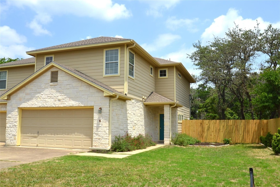 View of front of property featuring a front lawn,