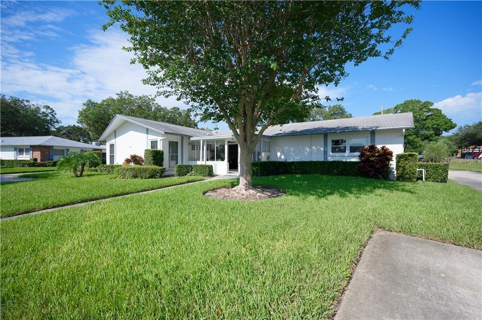 Mature landscaping offers some shade throughout th