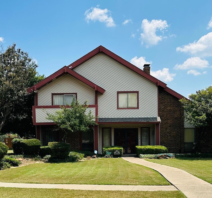 View of front of home with a front yard