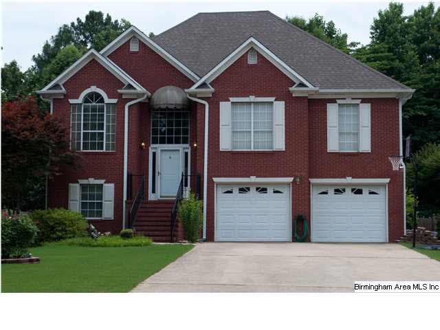 Maintenance free exterior with brick and vinyl sid
