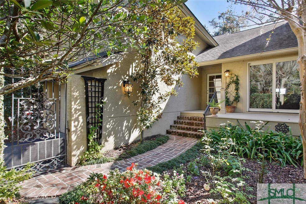 Private Front Courtyard with lush landscaping, dec