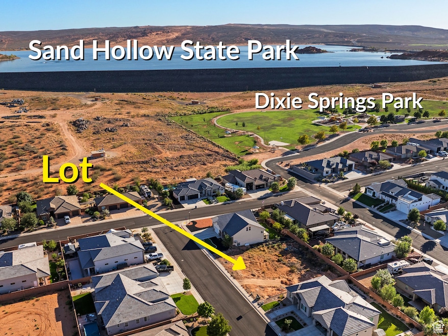 Aerial perspective of suburban area with a large body of water