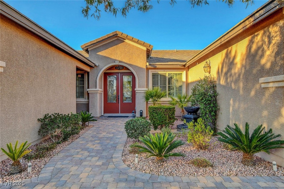 Lovely courtyard entry to home with beautiful dese