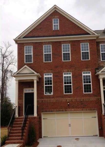 Exterior Front. This beautiful end unit features a