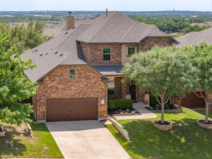 View of front of house featuring a shingled roof,