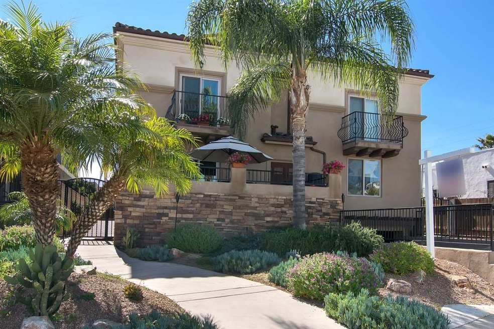 Spanish style townhouse with wonderful curb appeal
