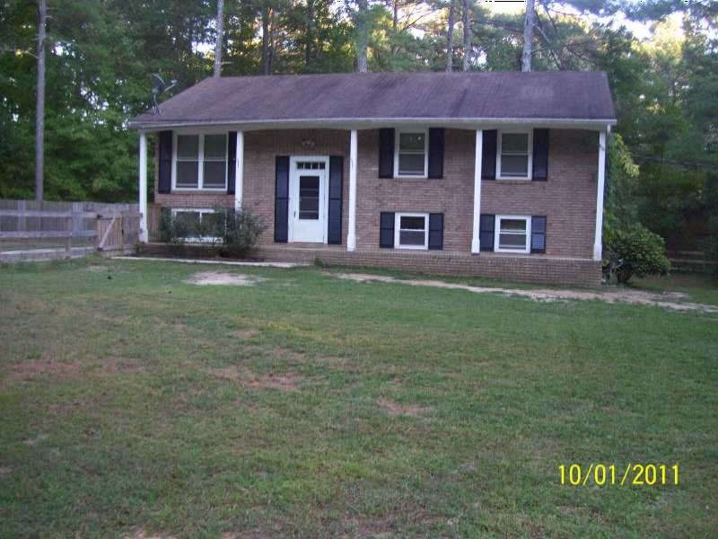 Exterior Front. Front of the house that is in a cu