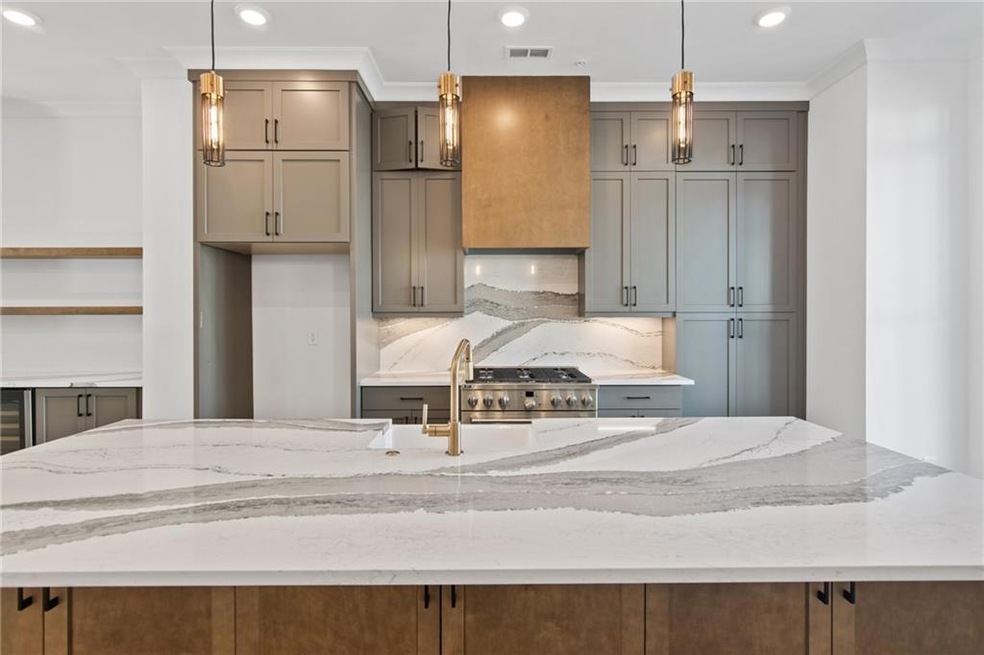 Waterfall Island with hidden kitchen storage