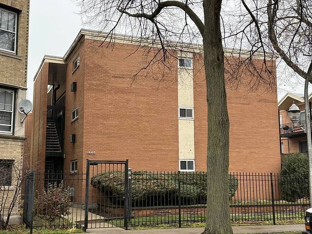 1636 W Estes Ave unit 108, Chicago, IL 60626 - photo 1