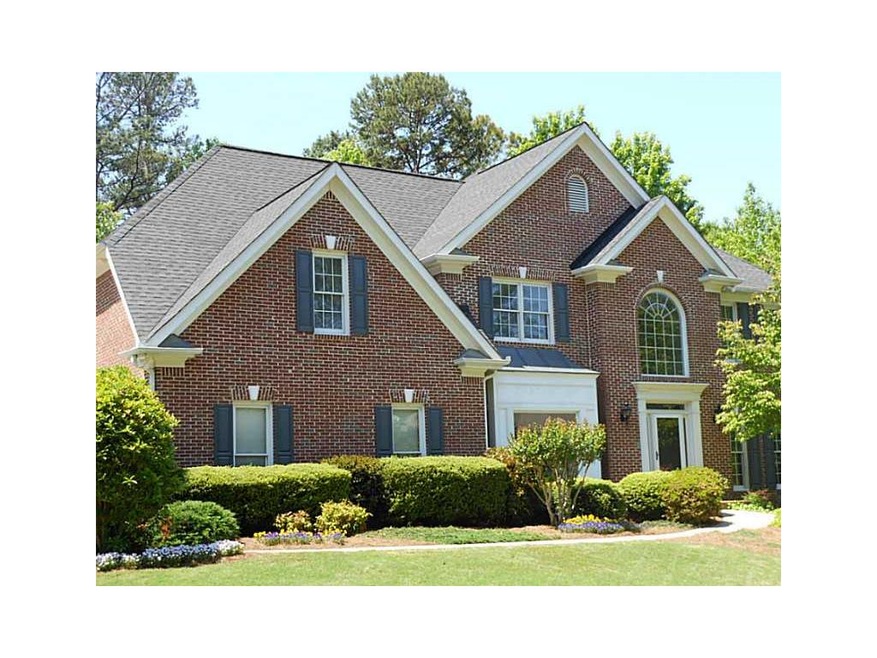 Exterior Front. Beautiful three sided brick home w
