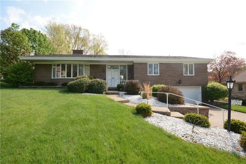 Great curb appeal in this 4 bedroom stone ranch wi