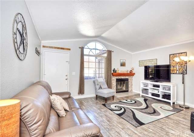 Spacious living room with high, vaulted ceilings, 