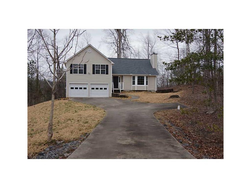 Exterior Front. Long driveway from the cul de sac 