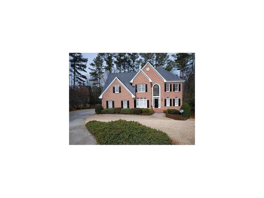 Exterior Front. Gorgeous 3 side brick home on spac