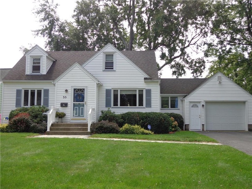 Welcome to 35 Garden Lane.  This spacious cape has