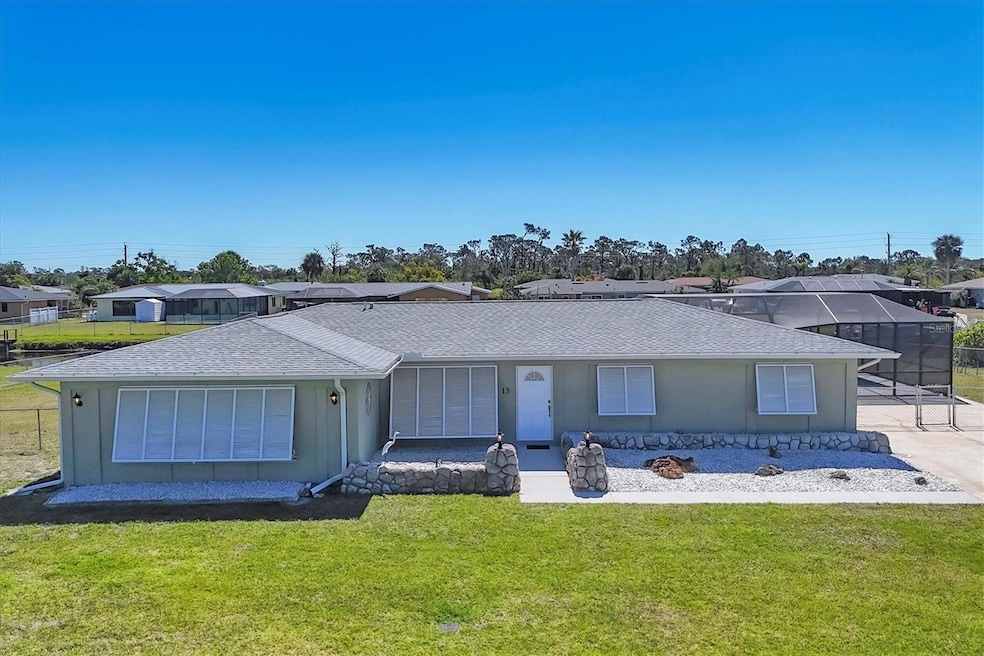 13 Caddy Rd, Rotonda West, FL 33947 - photo 1