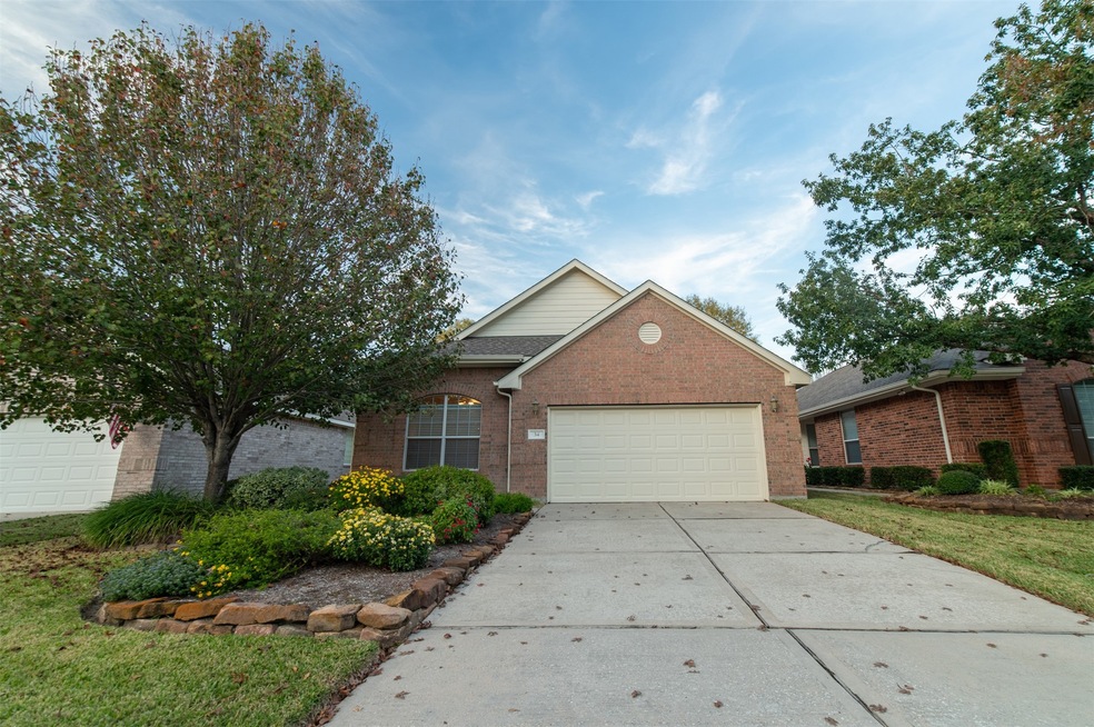 34 S Dylanshire Cir, double car garage and driveway. HOA maintains lawn and landscaping and exterior paint