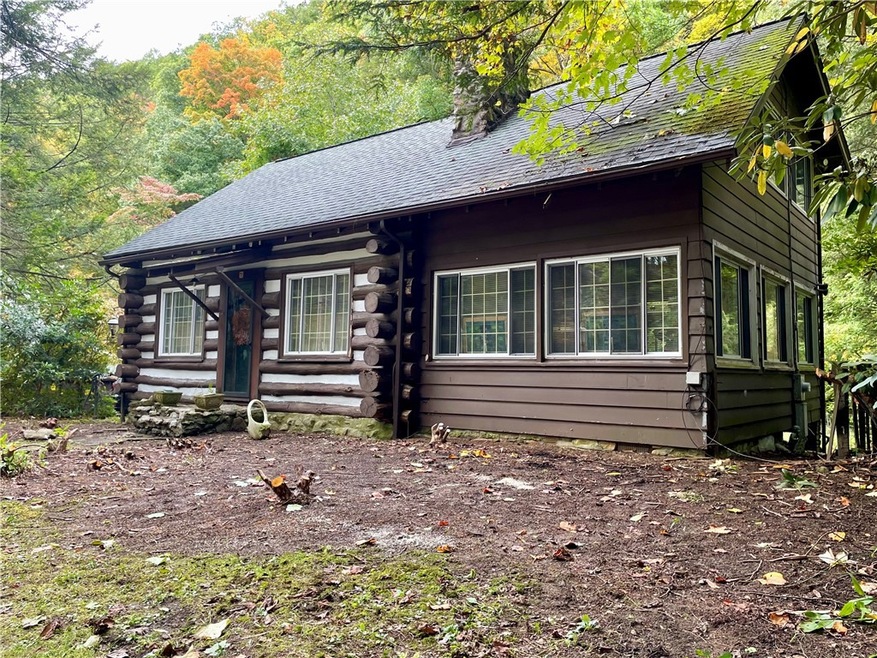 Historic Log Home with tasteful additions!