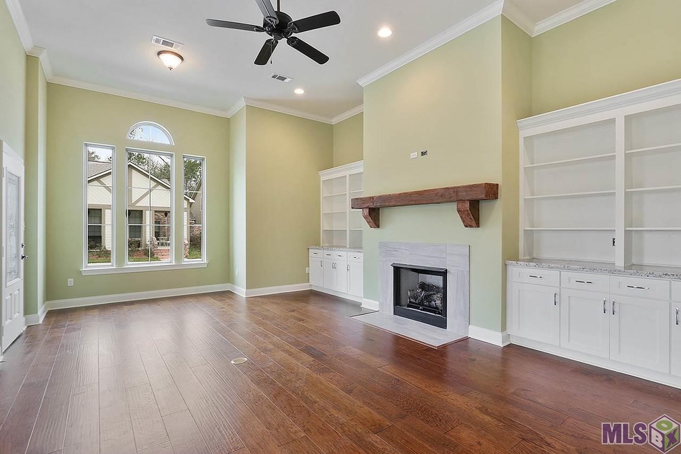 Living Room,large custom window, Fireplace, Custom
