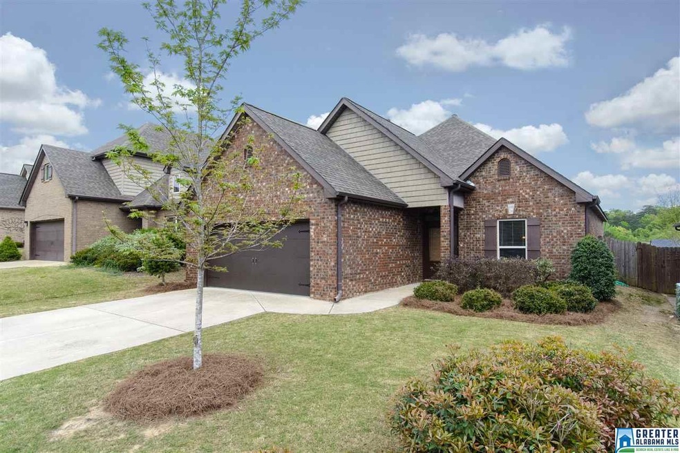 Brick and vinyl exterior for easy maintenance. Nic