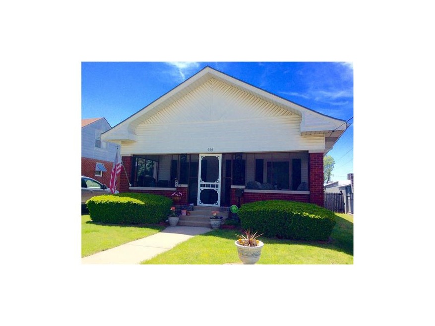 Charming screened front porch on this 1930's bunga