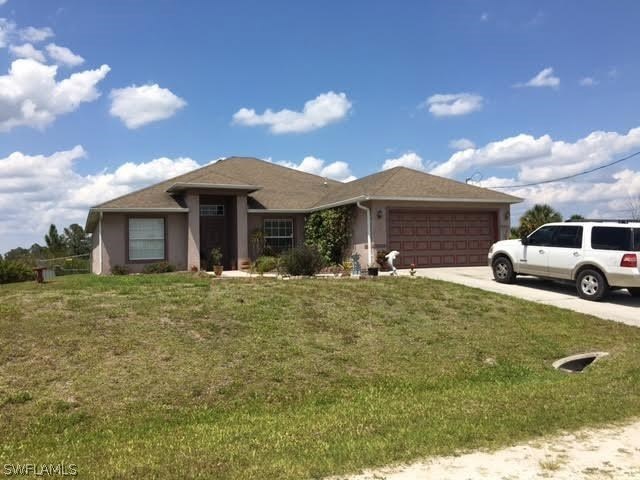 3102 64th St W, Lehigh Acres, FL 33971 - photo 1