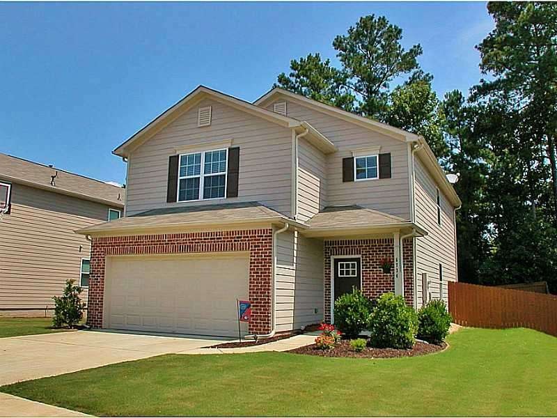 Exterior Front. Great curb appeal, large side yard