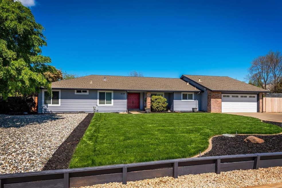WOW! Check out this stunning home on almost 1 acre