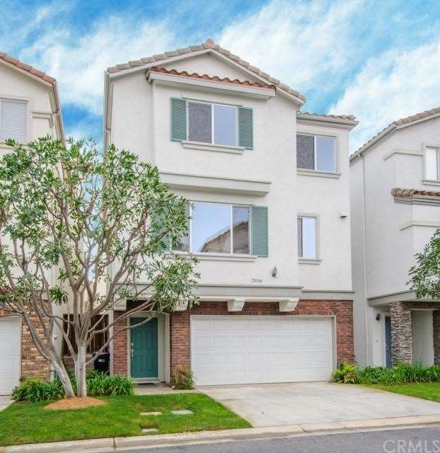 lovely entrance- check out 2 car garage AND 2 car 