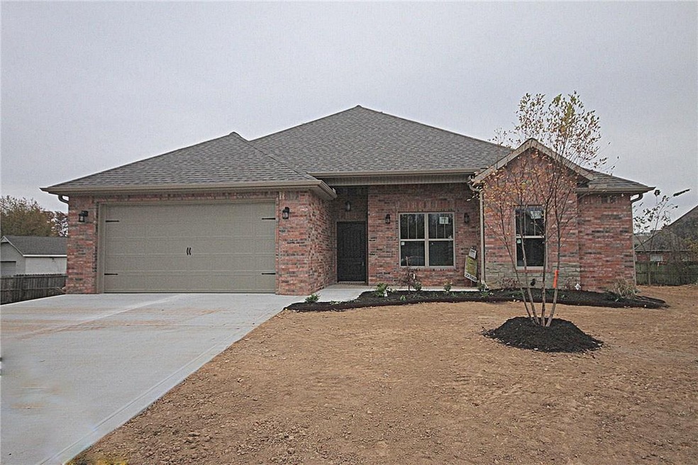 Beautiful brick home on 0.36 acres at the end of a cul-de-sac. Very close to Rogers High School!