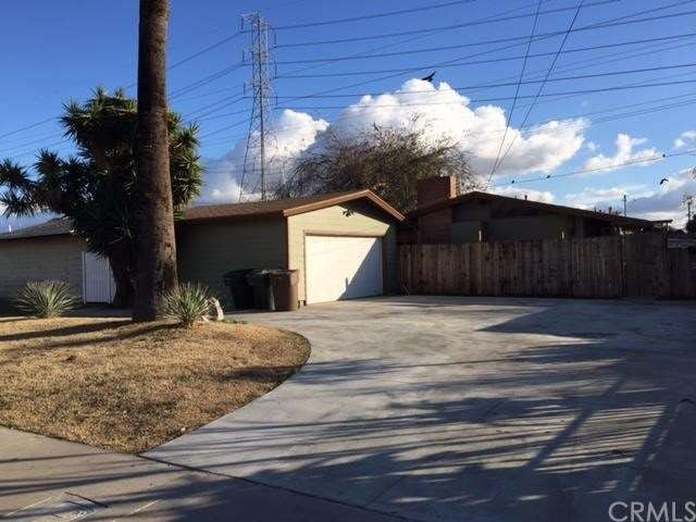 Long Driveway with detached two car garage and lot