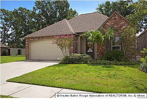 Front of home with 2car garage.