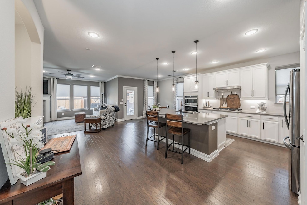 View into spacious kitchen and family room