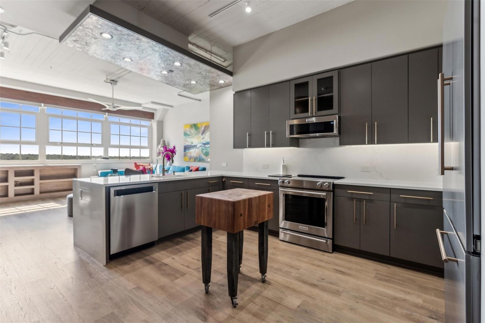 Kitchen featuring appliances with stainless steel 