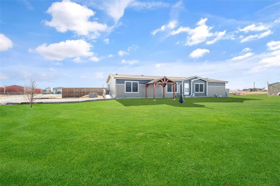 Beautiful Residential Entry Modular Home on acreage with concrete pier and beam anchored down foundation.
