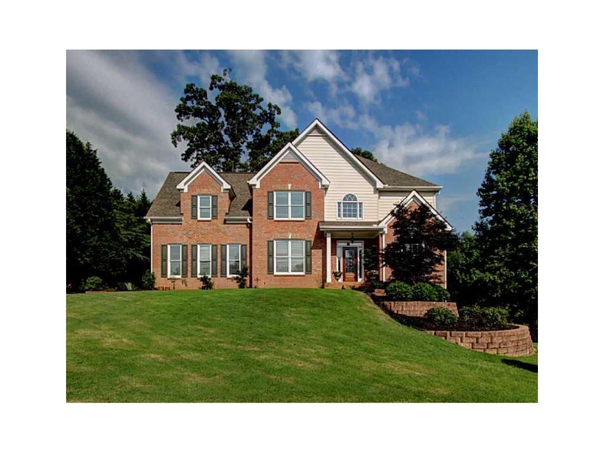 Exterior Front. Traditional home with a 2 car gara